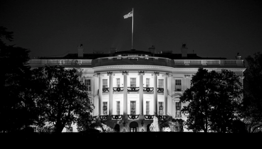 The White House at night, black and white
