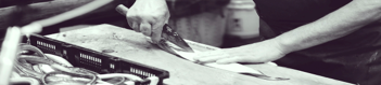 Hands at a workbench — written, decision-ready craft