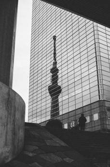 Tokyo tower reflected in glass — Asia correspondence